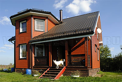 Дом с фасадом из сайдинга Миттен