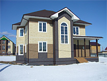 Дом с отделкой фасадными панелями Docke-R Stein