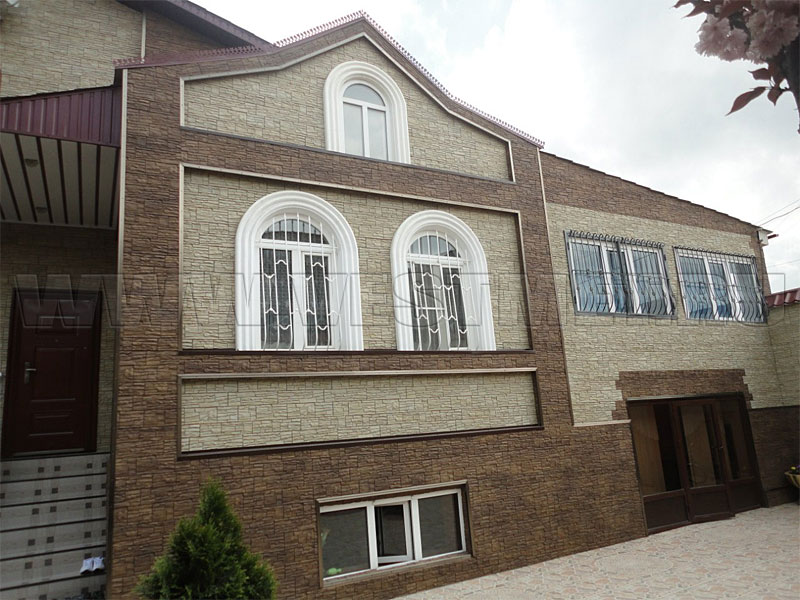 Фото 2 - дом с отделкой фасадными панелями Деке Edel, цвет Родонит